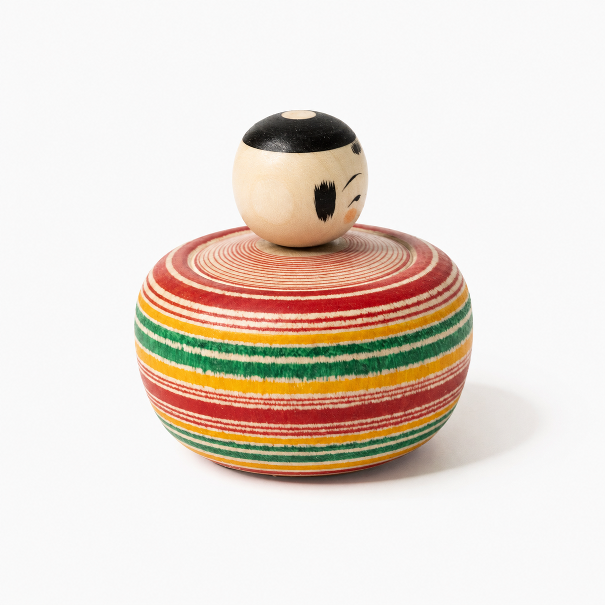 Red and green Bōzu Ejiko kokeshi by Yusuke Sato.