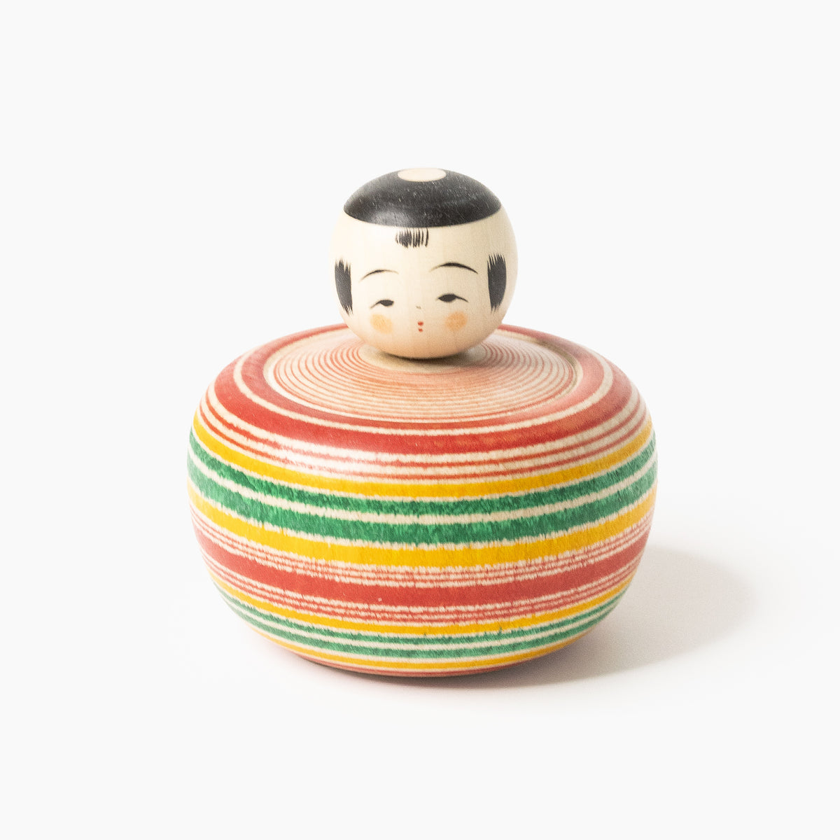 Front view of the Makoto-style Ejiko kokeshi in red and green