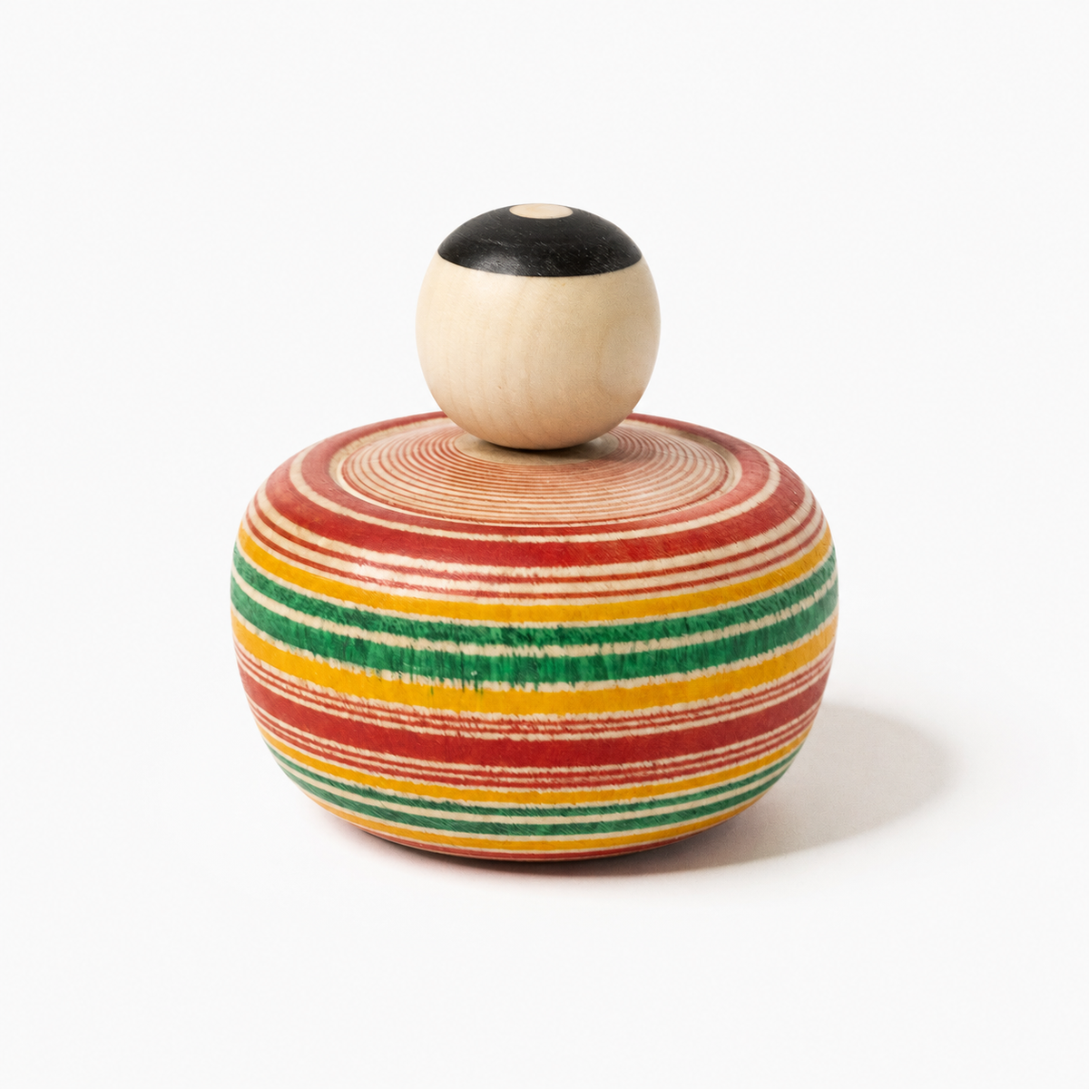 Red and green Bōzu Ejiko kokeshi by Yusuke Sato.