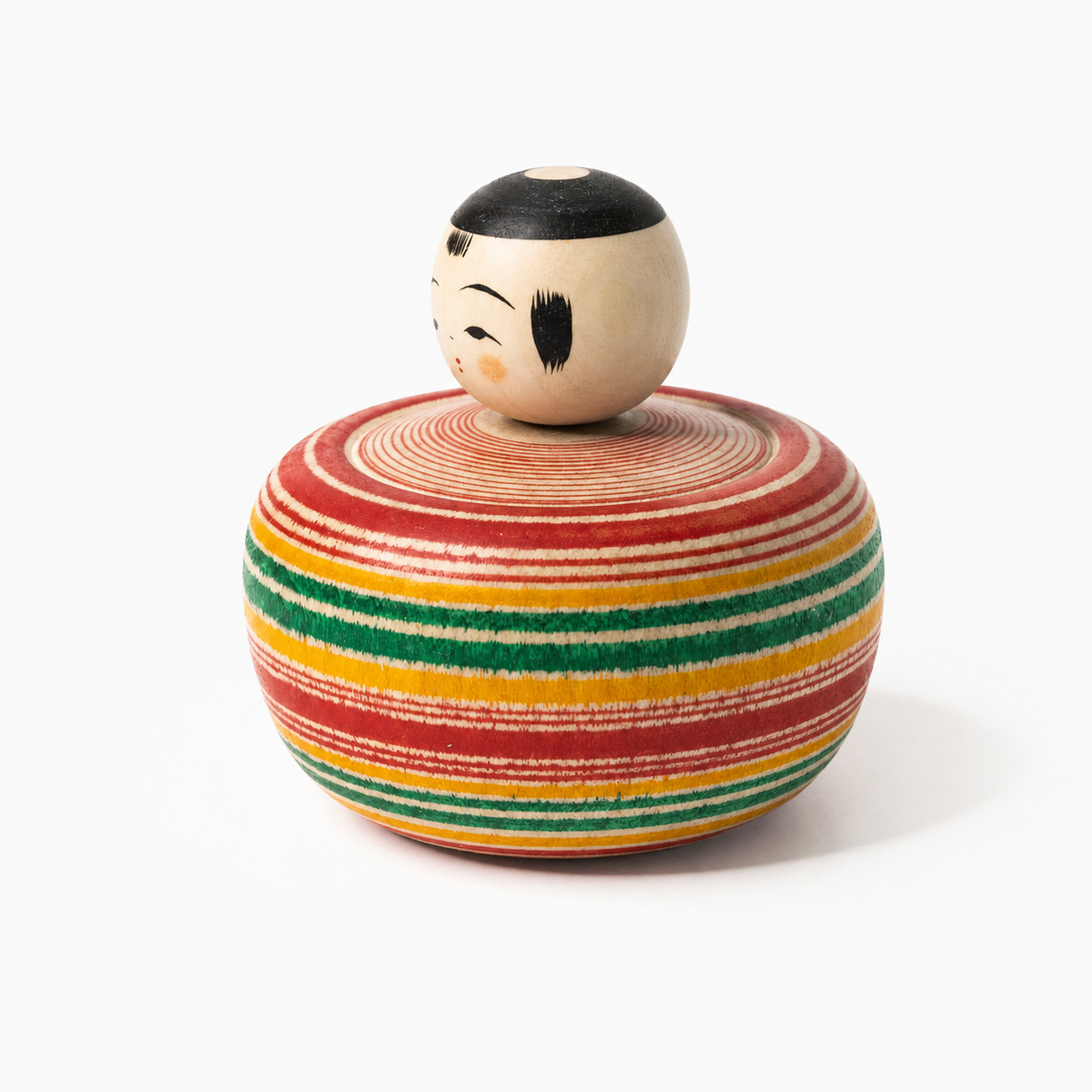 Red and green Bōzu Ejiko kokeshi by Yusuke Sato.