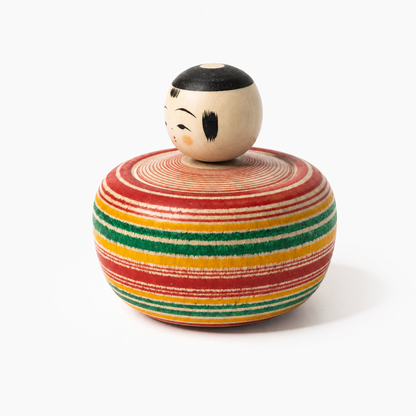 Red and green Bōzu Ejiko kokeshi by Yusuke Sato.