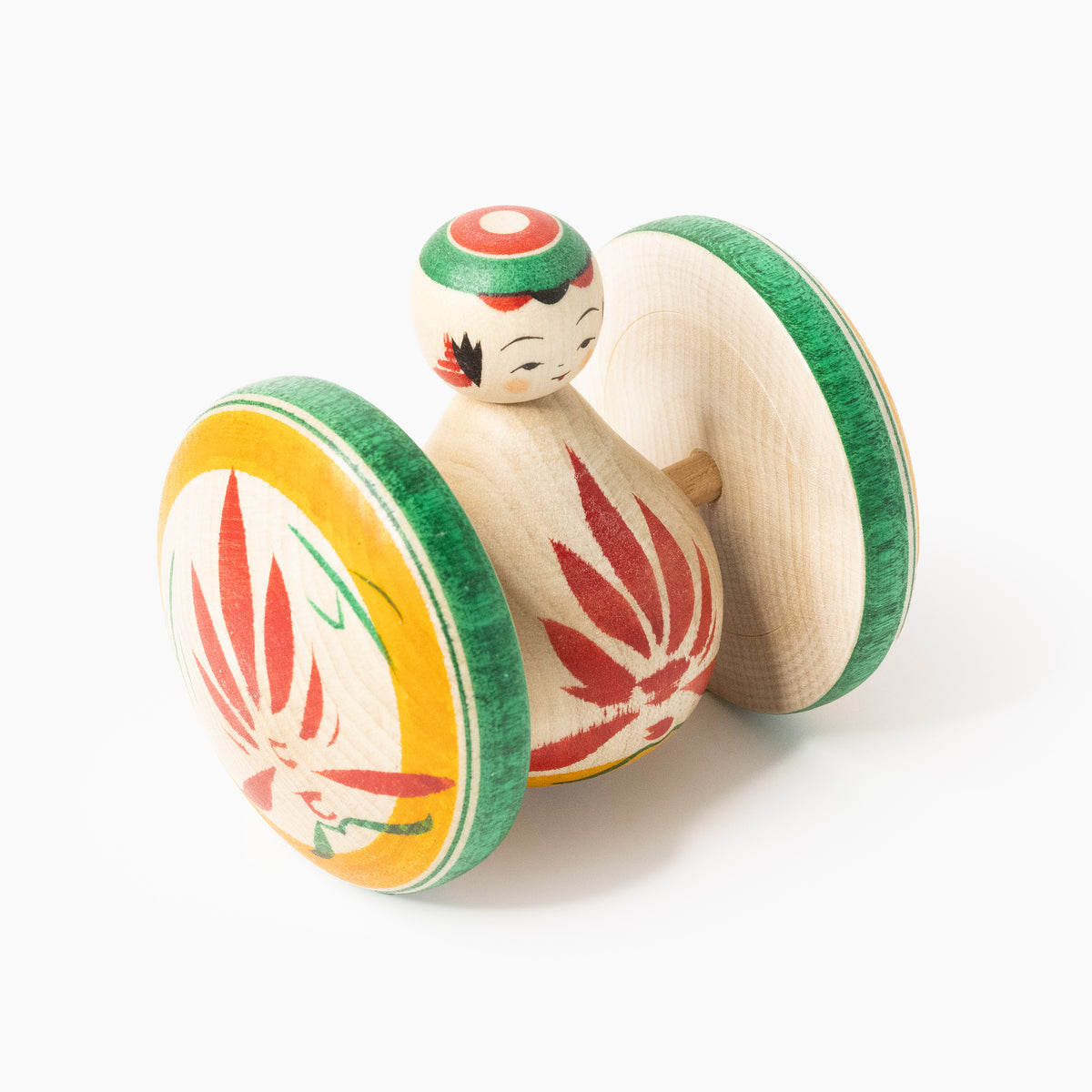 Wooden Fuku Kuruma figure with chrysanthemum in three-quarter side view