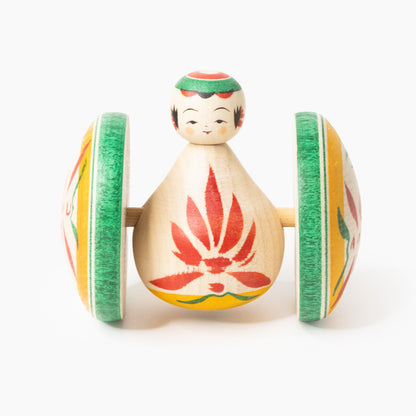 Front view of the Fuku Kuruma with red chrysanthemum and two wooden wheels