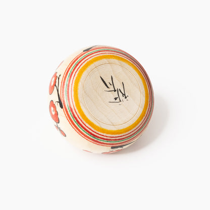 Underside of the red Nemuri Hina Ejiko with artist’s signature