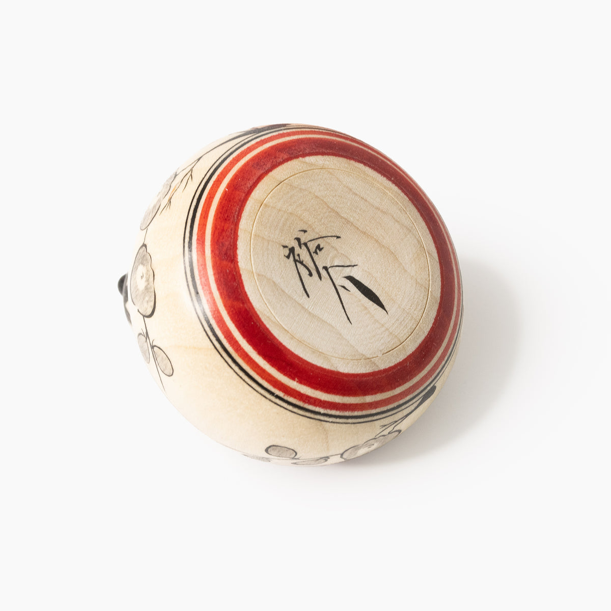 Underside of the black-and-white Nemuri Hina Ejiko with artist’s signature